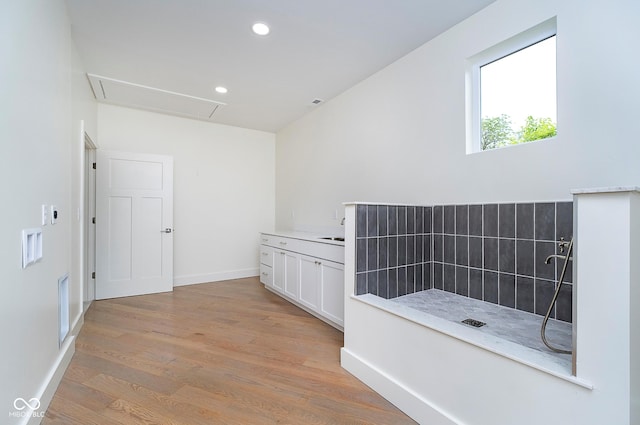 2130 Brookside Pkwy N Drive, Indianapolis, IN 46201 - bathroom with wood finished floors, recessed lighting, and vanity