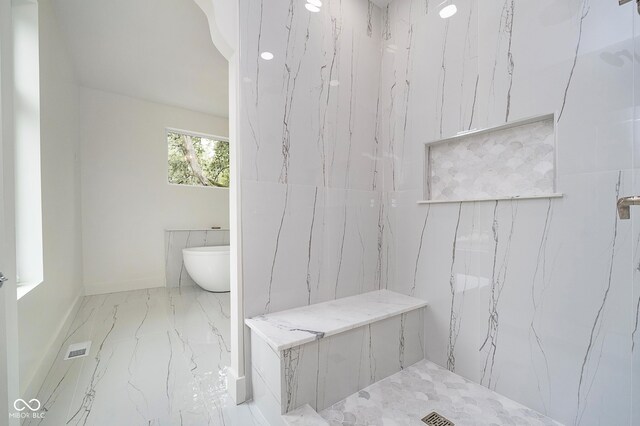 2130 Brookside Pkwy N Drive, Indianapolis, IN 46201 - full bath featuring marble tiled floors and a marble finish shower