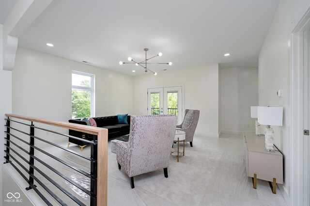 2130 Brookside Pkwy N Drive, Indianapolis, IN 46201 - living area featuring french doors, recessed lighting, light colored carpet, and a chandelier