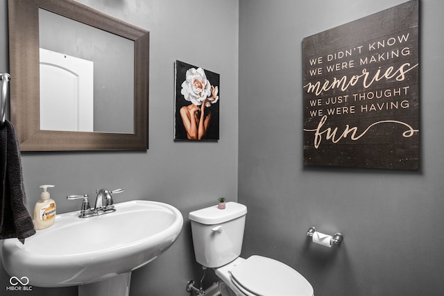 6176 Brighton Dr, Whitestown, IN 46075 - half bath featuring a sink and toilet