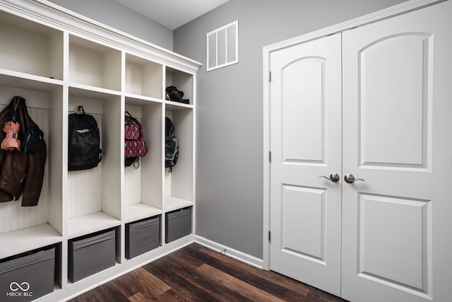 6176 Brighton Dr, Whitestown, IN 46075 - mudroom featuring dark wood-type flooring and baseboards