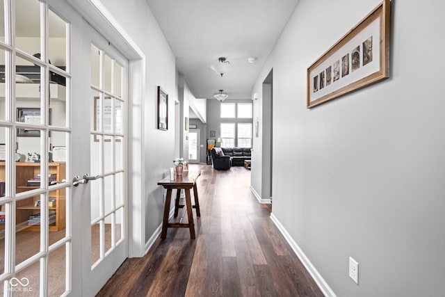 6176 Brighton Dr, Whitestown, IN 46075 - corridor with dark wood finished floors and french doors