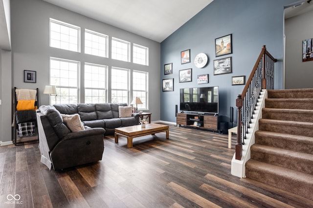 6176 Brighton Dr, Whitestown, IN 46075 - living area with high vaulted ceiling, dark wood-type flooring, and stairs