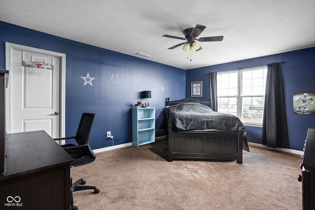 6176 Brighton Dr, Whitestown, IN 46075 - carpeted bedroom featuring an office area, a textured ceiling, and a ceiling fan
