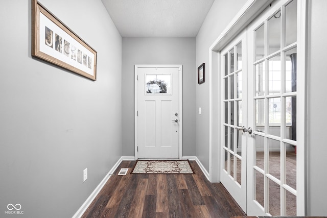 6176 Brighton Dr, Whitestown, IN 46075 - doorway to outside featuring french doors, dark wood finished floors, and a textured ceiling