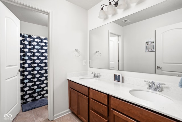 6176 Brighton Dr, Whitestown, IN 46075 - full bath featuring double vanity and tile patterned floors