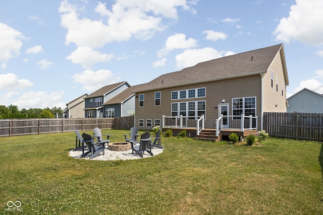 6176 Brighton Dr, Whitestown, IN 46075 - back of property with a fire pit, a deck, a fenced backyard, and a patio area