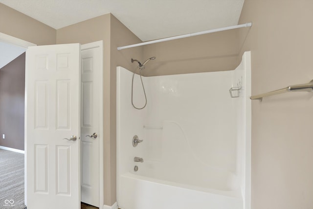 5674 Brownstone Dr, Indianapolis, IN 46220 - bathroom featuring baseboards and shower / tub combination