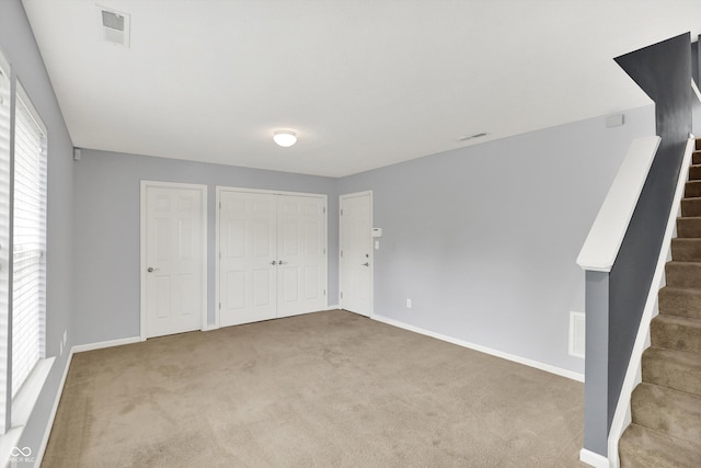 5674 Brownstone Dr, Indianapolis, IN 46220 - unfurnished bedroom featuring carpet floors and baseboards