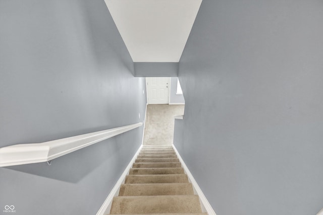 5674 Brownstone Dr, Indianapolis, IN 46220 - staircase with baseboards and carpet