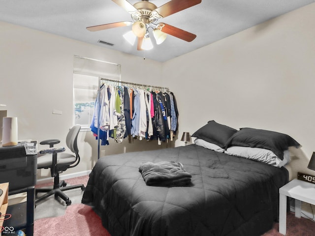 5626 Prince Woods Cir, Indianapolis, IN 46224 - carpeted bedroom with ceiling fan and baseboards