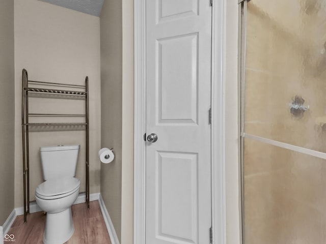 5626 Prince Woods Cir, Indianapolis, IN 46224 - full bathroom featuring wood finished floors and a stall shower