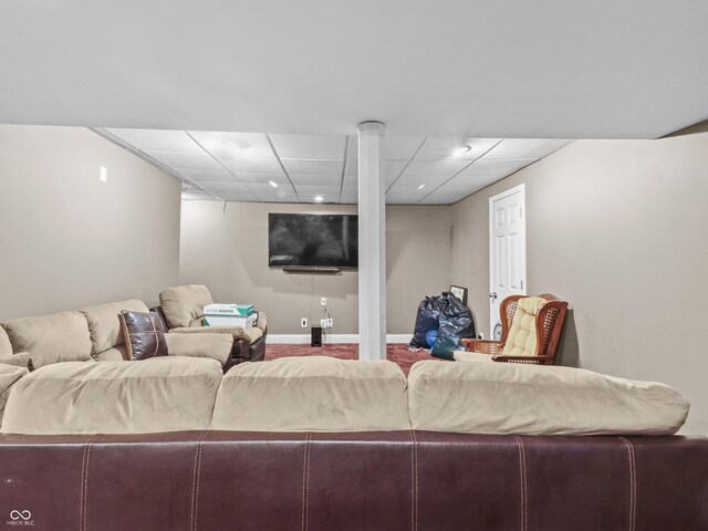 5626 Prince Woods Cir, Indianapolis, IN 46224 - carpeted living area featuring a paneled ceiling and baseboards