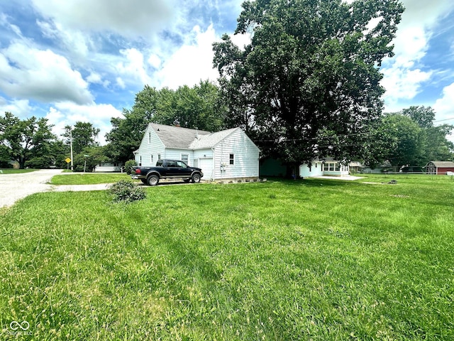 1000 Meadow Ln, Greencastle, IN 46135 - view of property exterior featuring a yard and driveway