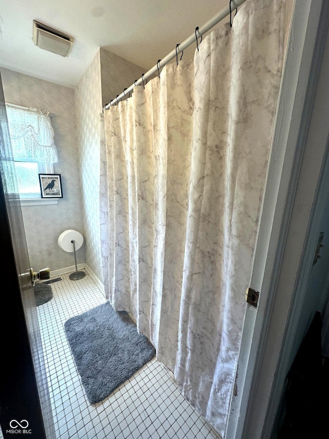 1000 Meadow Ln, Greencastle, IN 46135 - bathroom featuring tile patterned floors and curtained shower