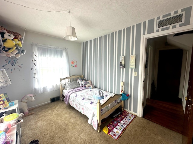 1000 Meadow Ln, Greencastle, IN 46135 - carpeted bedroom with a textured ceiling