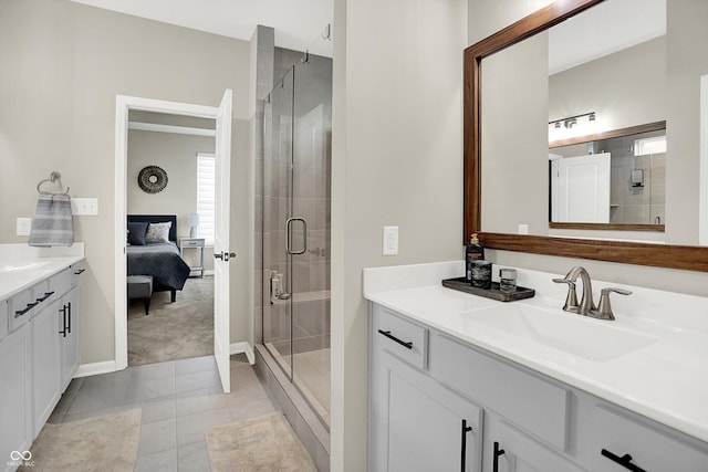 1319 Petit Verdot Dr, Westfield, IN 46074 - full bath featuring two vanities, a stall shower, ensuite bath, and tile patterned flooring