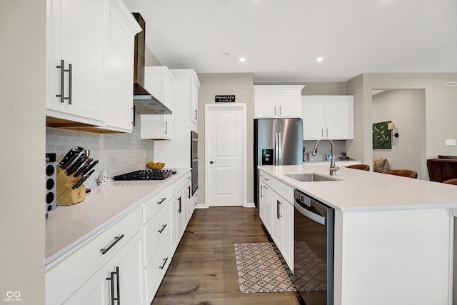 1319 Petit Verdot Dr, Westfield, IN 46074 - kitchen with dishwasher, wall chimney exhaust hood, dark wood-style flooring, a center island with sink, and backsplash