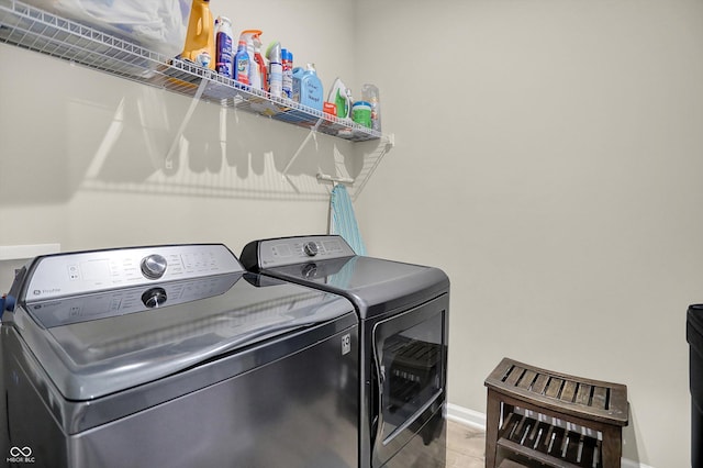 1319 Petit Verdot Dr, Westfield, IN 46074 - laundry room featuring washing machine and dryer and baseboards