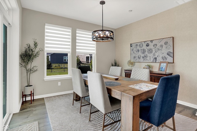 1319 Petit Verdot Dr, Westfield, IN 46074 - dining area featuring light wood-style floors and a chandelier