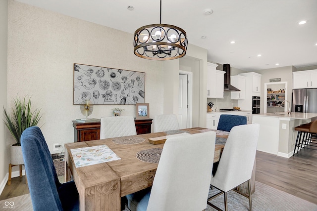 1319 Petit Verdot Dr, Westfield, IN 46074 - dining room featuring wood finished floors, a chandelier, and recessed lighting
