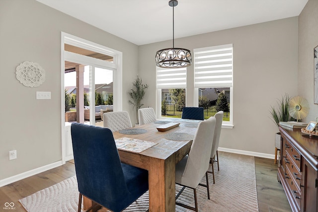 1319 Petit Verdot Dr, Westfield, IN 46074 - dining space featuring a chandelier and wood finished floors