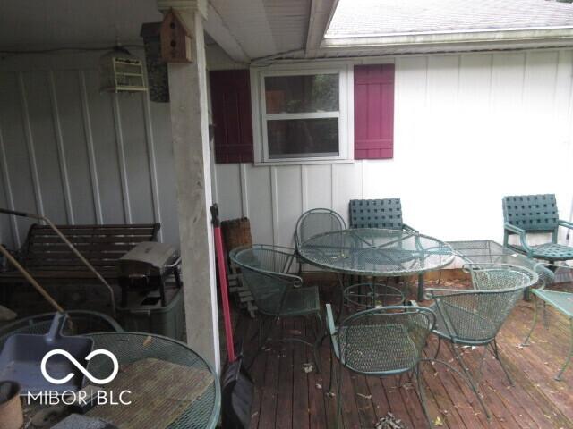 2610 Marywood Dr, Southport, IN 46227 - wooden terrace with outdoor dining space