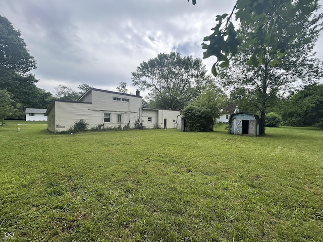 1330 Schleicher Ave, Indianapolis, IN 46229 - view of grassy yard with a shed