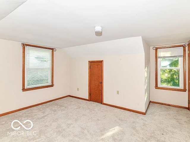18378 Southeastern Pkwy, Fortville, IN 46040 - unfurnished room featuring light colored carpet and lofted ceiling