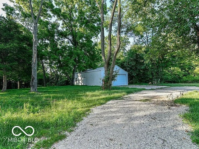 18378 Southeastern Pkwy, Fortville, IN 46040 - view of yard featuring an outbuilding and a detached garage
