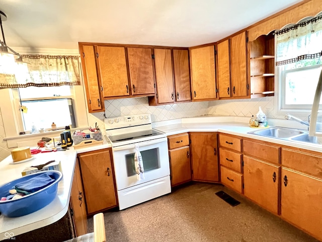 4096 N 200 W, Greenfield, IN 46140 - kitchen featuring electric stove, plenty of natural light, decorative backsplash, and light countertops