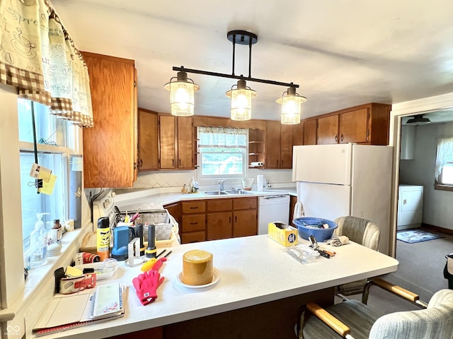 4096 N 200 W, Greenfield, IN 46140 - kitchen with brown cabinets, white appliances, and healthy amount of natural light