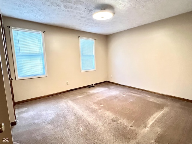 4096 N 200 W, Greenfield, IN 46140 - carpeted empty room with baseboards and a textured ceiling