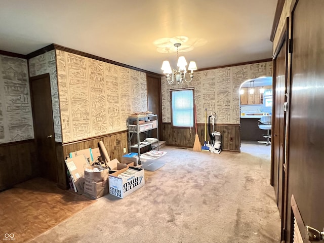 4096 N 200 W, Greenfield, IN 46140 - carpeted dining area with wainscoting, a chandelier, ornamental molding, and wood walls