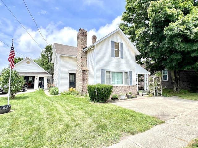 4096 N 200 W, Greenfield, IN 46140 - traditional home with a chimney, a front yard, and brick siding