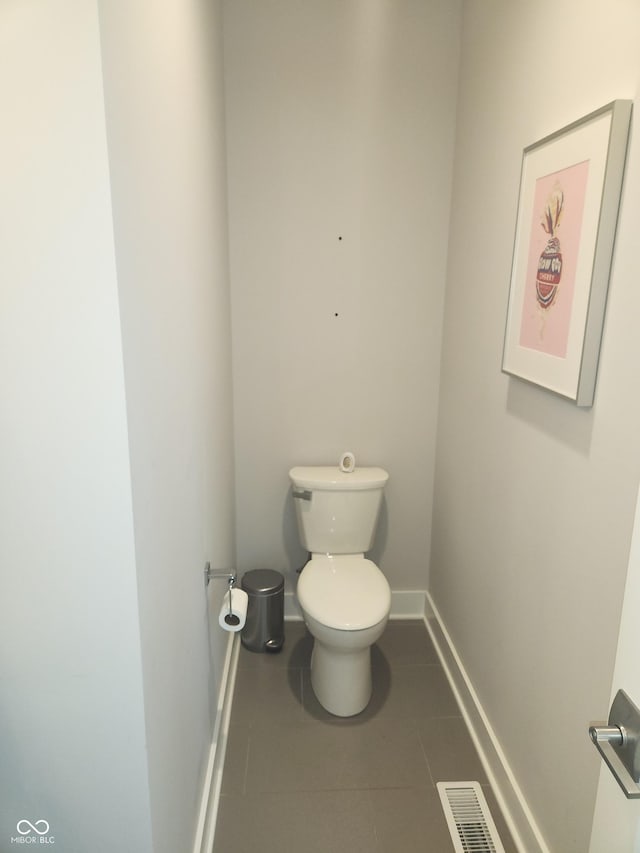955 Dorman St, Indianapolis, IN 46202 - bathroom with toilet and tile patterned floors