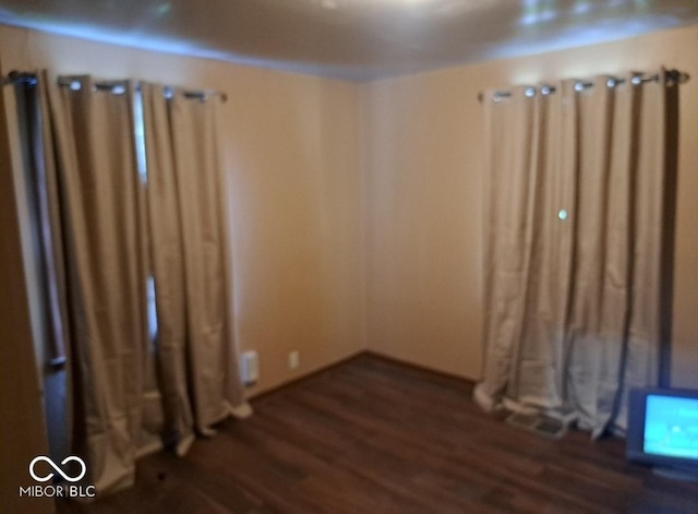 103 N Chester Ave, Indianapolis, IN 46201 - unfurnished room with dark wood-type flooring
