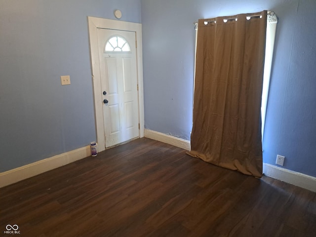 103 N Chester Ave, Indianapolis, IN 46201 - entrance foyer featuring dark wood finished floors and baseboards