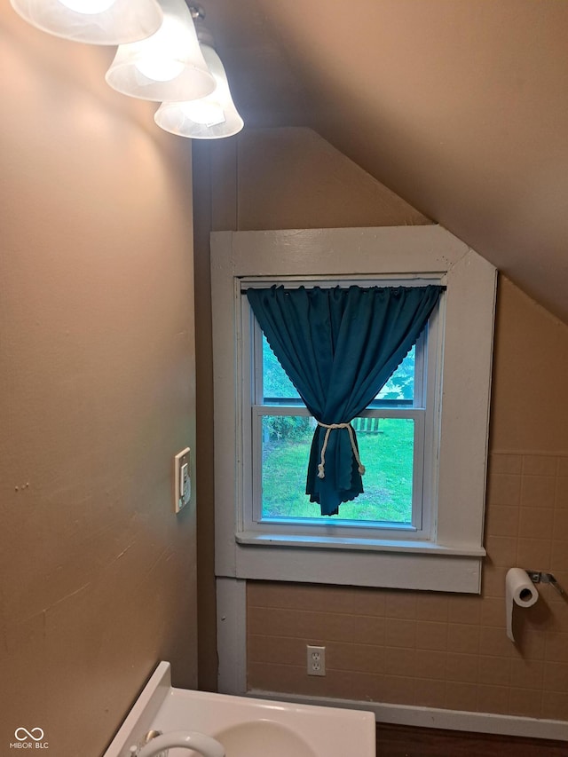 103 N Chester Ave, Indianapolis, IN 46201 - half bathroom featuring lofted ceiling and toilet