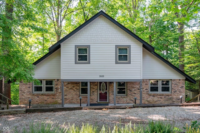 3669 Glenwood Dr, Martinsville, IN 46151 - traditional-style home with brick siding and a porch