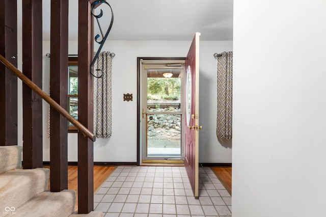 3669 Glenwood Dr, Martinsville, IN 46151 - foyer with light tile patterned flooring and stairway