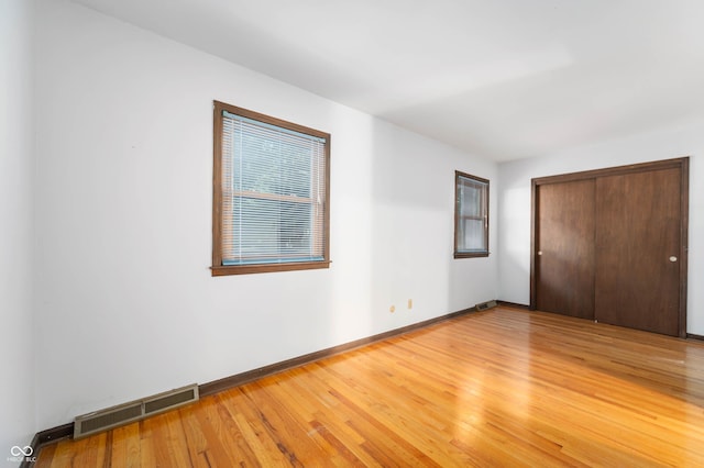 3669 Glenwood Dr, Martinsville, IN 46151 - unfurnished bedroom featuring light wood finished floors and a closet
