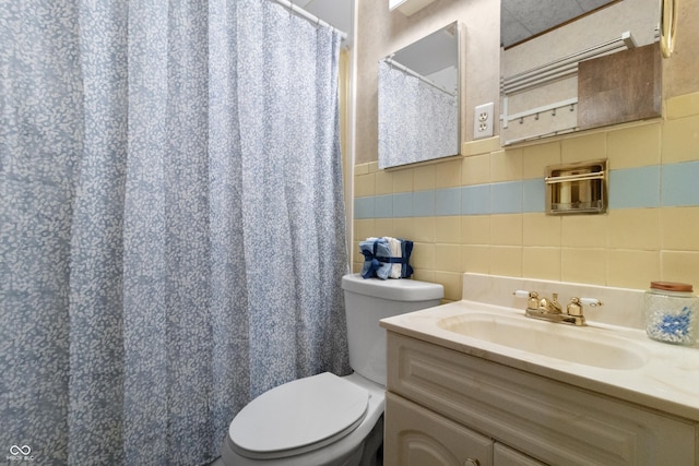 3534 Carr Ave, Indianapolis, IN 46221 - full bath with vanity, tile walls, tasteful backsplash, and curtained shower