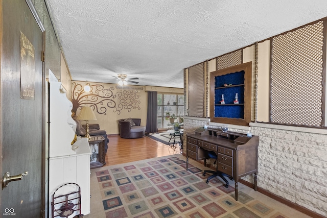 3534 Carr Ave, Indianapolis, IN 46221 - living area with a textured ceiling, a ceiling fan, wood finished floors, and an office area