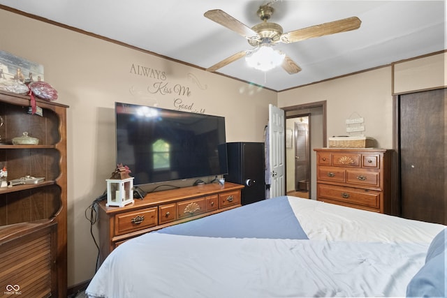 3534 Carr Ave, Indianapolis, IN 46221 - bedroom featuring ornamental molding and a ceiling fan