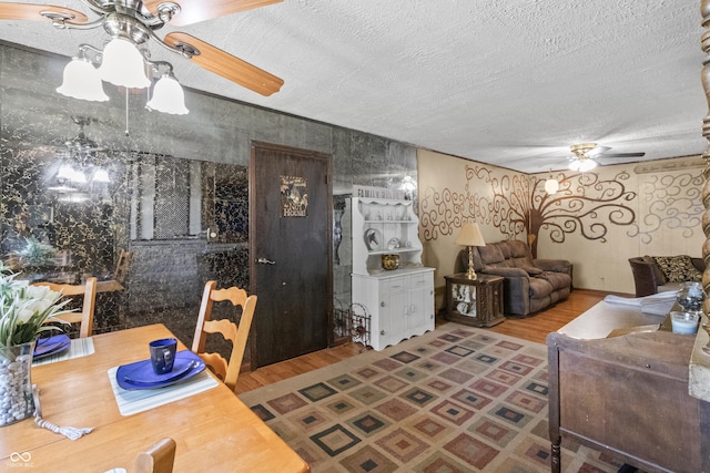 3534 Carr Ave, Indianapolis, IN 46221 - living area featuring ceiling fan, a textured ceiling, and wood finished floors