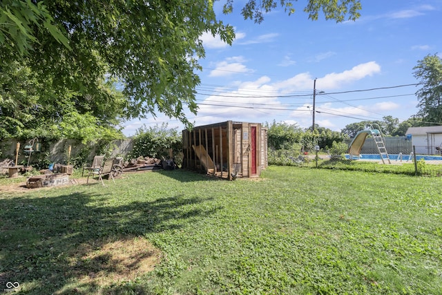 3534 Carr Ave, Indianapolis, IN 46221 - fenced backyard with an outdoor structure