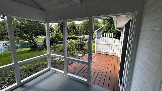 2083 Kerns Ct, Carmel, IN 46280 - unfurnished sunroom with a water view, lofted ceiling, and view of scattered trees