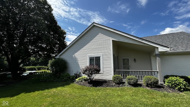 2083 Kerns Ct, Carmel, IN 46280 - view of property exterior featuring a lawn and a shingled roof