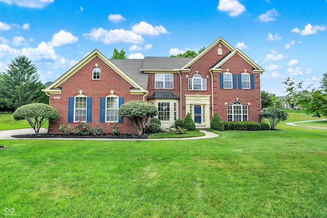 12484 Pasture View Ct, Carmel, IN 46033 - colonial home featuring a front lawn and brick siding